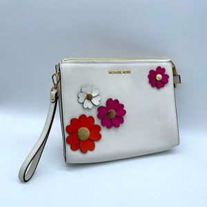 Michael Kors Gorgeous floral applique design on front, plain back wrist bag